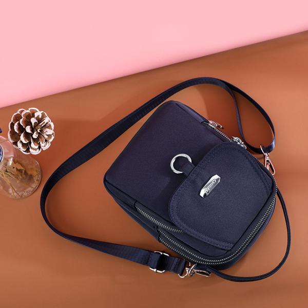 Lätt vattentät crossbody-väska med flera fickor